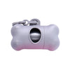 A light gray bone-shaped poop bag dispenser with a metal clip.