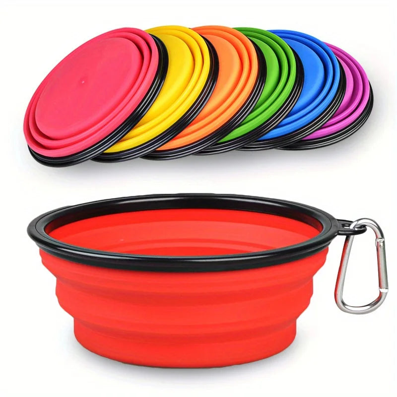 A set of colorful silicone dog travel bowls in various shades of pink, yellow, orange, green, and blue.