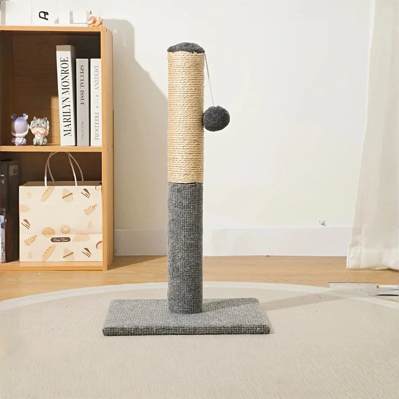 A tall sisal cat scratching post with a woven column and a fuzzy ball, placed on a light-colored rug.