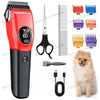 A red pet hair clipper with various attachments, including combs and a grooming tool, next to a small dog.
