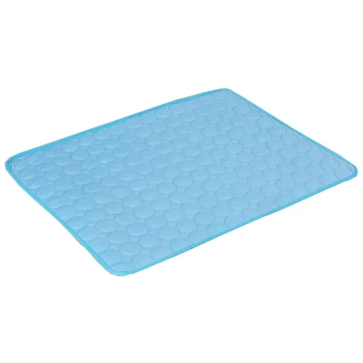 A light blue cooling pet mat with a hexagonal textured surface.
