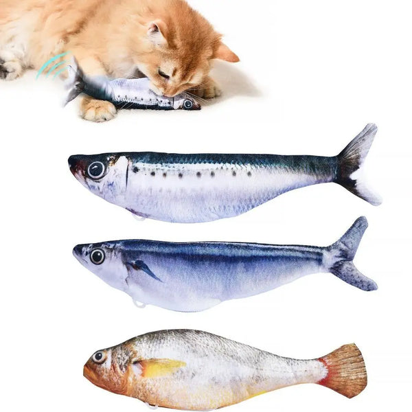 A small orange kitten is playing with a long, silver-colored fish toy.