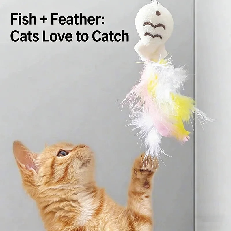 A tabby kitten is looking up at a feather and fish toy designed for cats to catch.