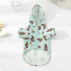 A light blue waterproof summer raincoat for dogs with brown bear patterns displayed on a white surface.