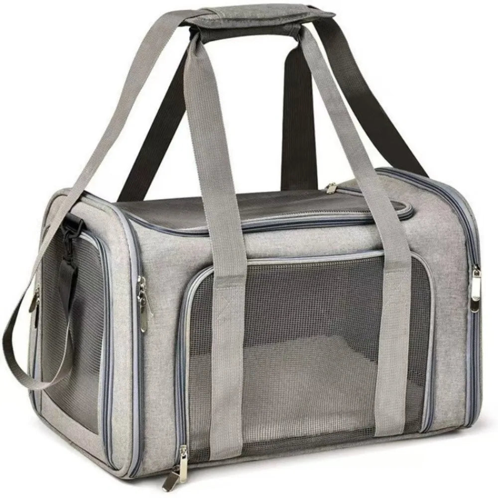 A gray breathable pet carrier backpack with padded straps and a mesh window for small dogs or cats.