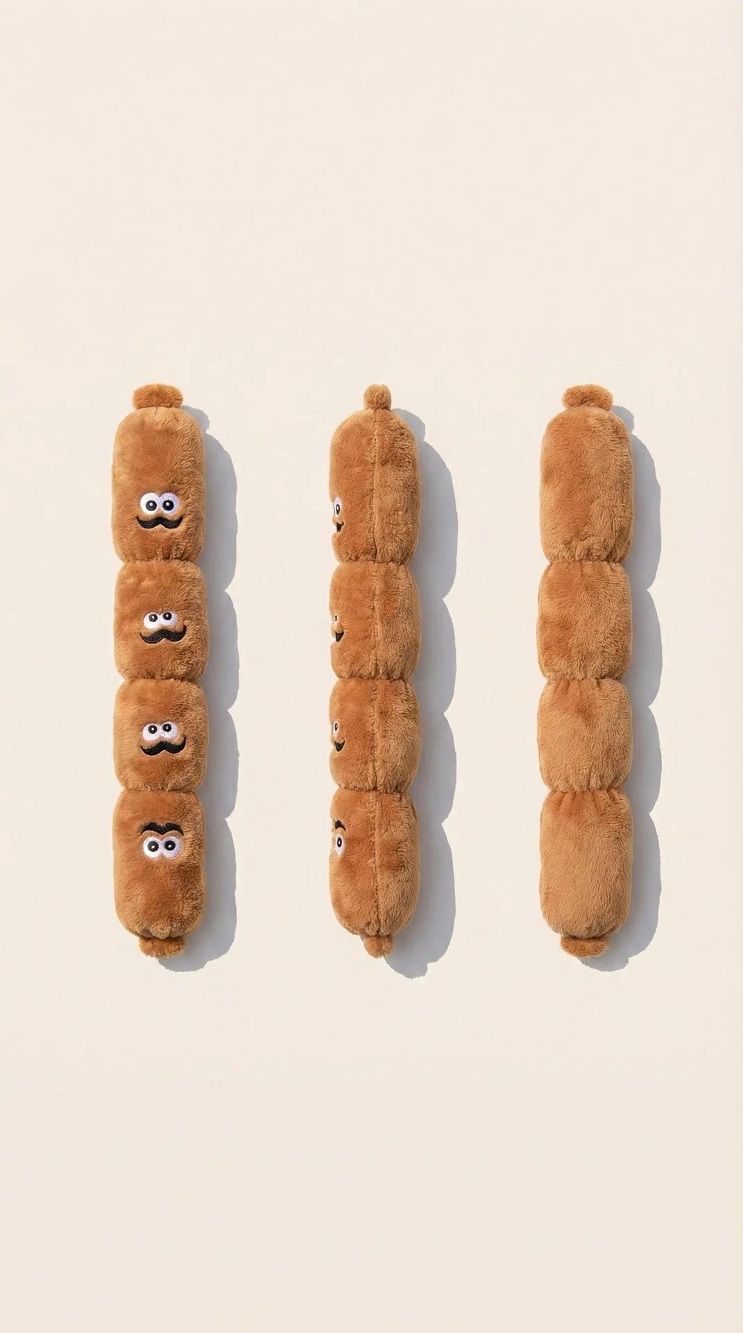 Three fluffy brown dog chew toys shaped like dogs with numbers on them displayed against a light background.