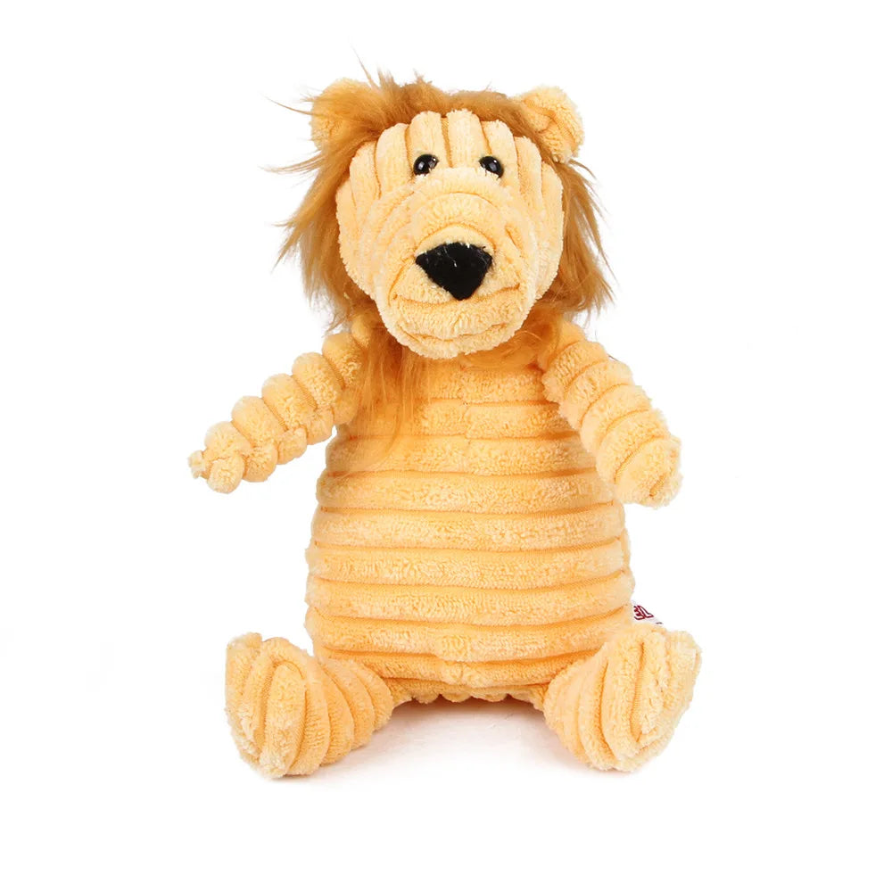 Un peluche de león dorado y marrón con nariz negra y pelaje amarillo.