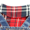 Close-up of a red and blue plaid denim jumpsuit for small dogs