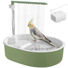A green automatic bird shower bath for parrots with a clear water spout and a small white air pump visible.