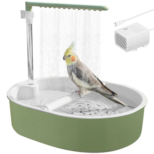 A green automatic bird shower bath for parrots with a clear water spout and a small white air pump visible.