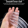 A hand is holding clear flexible PVC tubing, demonstrating its high transparency and smooth inner wall.