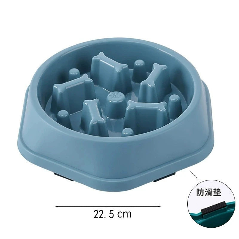 A light blue anti-choking slow feeder dog bowl with a puzzle design for feeding.
