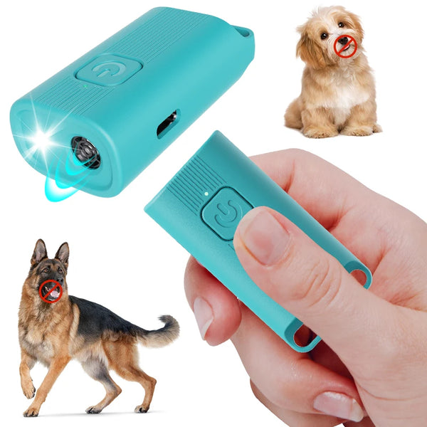 A hand holds a teal ultrasonic dog repeller device, with a small dog visible nearby.
