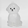 A clear, sculpted pet hair memorial keychain shaped like a dog sitting.