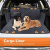 A dog is resting on a dark blue quilted cargo liner installed in the rear seat of a white vehicle.