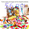 A bundle of mixed cat play toys including colorful pom-poms, feathers, and string toys.