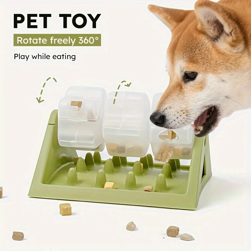 A dog is interacting with a green puzzle feeder toy designed to rotate freely and play while eating.