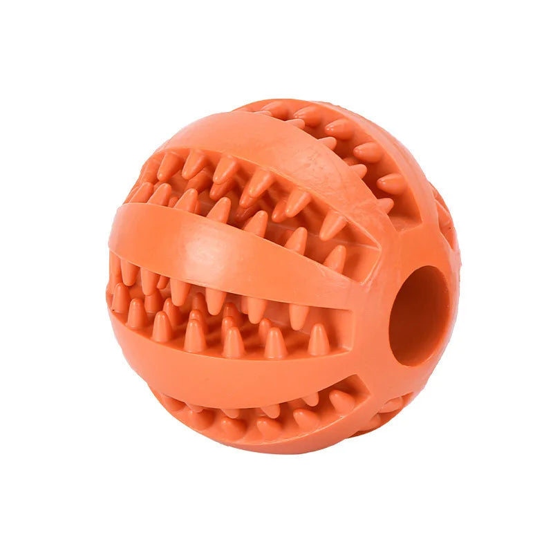 An orange rubber ball designed for interactive treat dispensing for dogs.