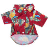 A red shirt with a tropical pineapple and leaf print, featuring a collared design.