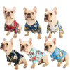 A collection of six French Bulldogs wearing Hawaiian leaf print shirts.