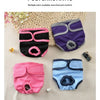 A collection of polychromatic reusable dog diapers in various colors including purple, pink, and blue.