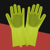 A pair of bright lime green pet grooming gloves for dogs and cats shown against a red background.