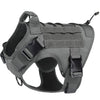A dark gray tactical dog harness with hook and loop panels and a handle is shown from the top.