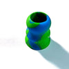 A close-up view of a silicone bat grip knob with a vibrant green and blue marbled pattern.