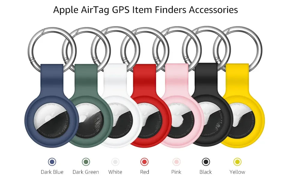 A row of silicone AirTag protective covers in various colors including dark blue, dark green, white, red, pink, black, and ye