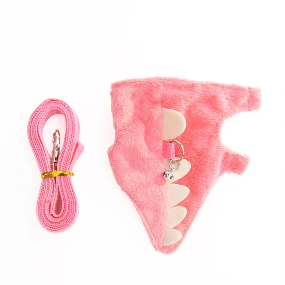 Pink fuzzy cartoon animal vest harness for pet training with a yellow cord and silver clip