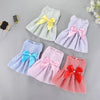A collection of pink, yellow, blue, and red striped bow dresses for small pets.