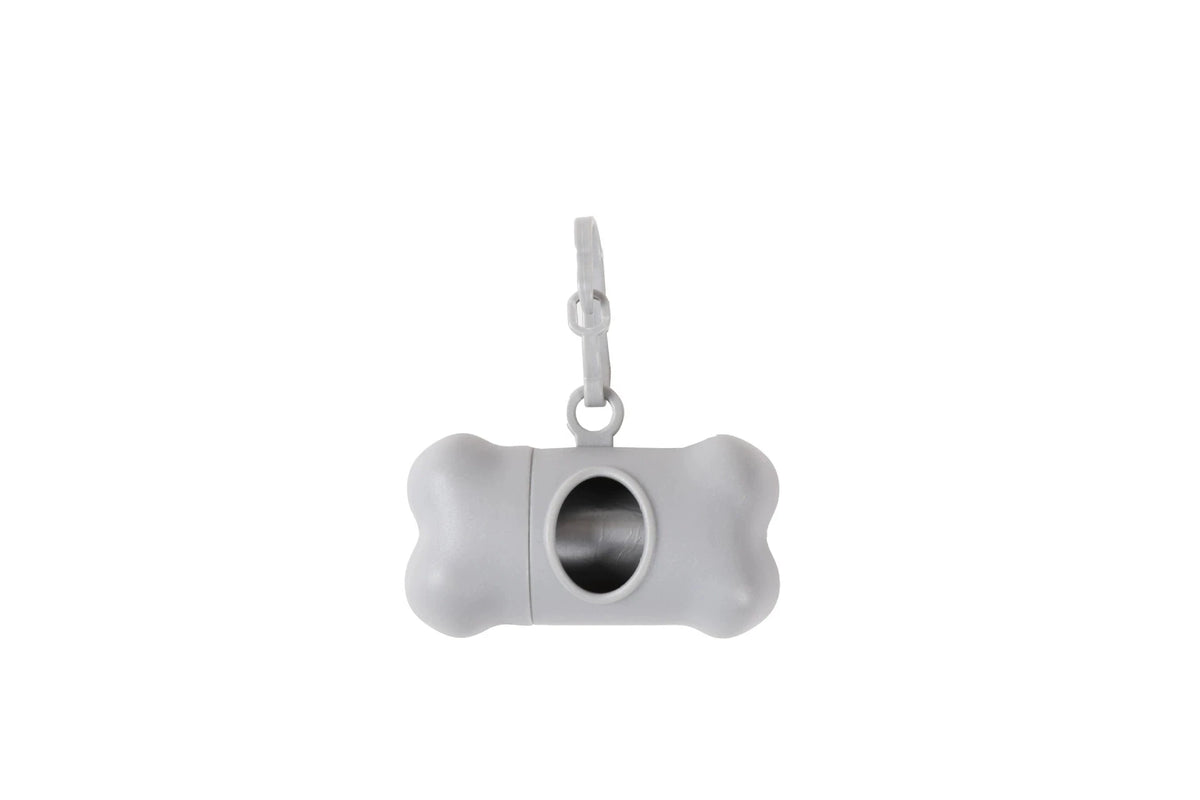 Dispensador portátil de bolsas para mascotas en forma de hueso blanco con clip de remolque.