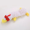A white and yellow plush toy resembling a bird with red accents, designed as an interactive squeaky chew toy for pets.