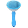 A light blue pet hair remover grooming brush with a white head and blue handle.