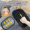 Black bidirectional electrostatic gloves removing cat hair strips from pet fur