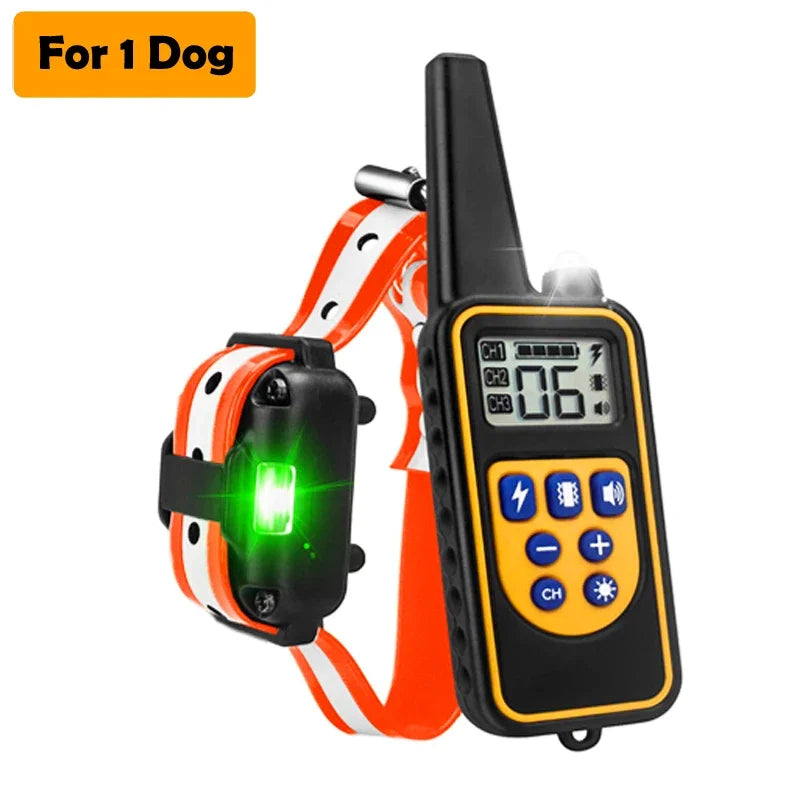 A black remote dog training collar with an LCD display and orange strap is shown.
