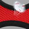 Red mesh pet harness and collar with black trim, highlighting breathable, soft, and cozy features.
