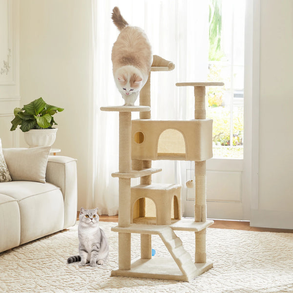 A light beige cat tree tower with sisal scratching posts and cozy condos, featuring a fluffy kitten and an adult cat.