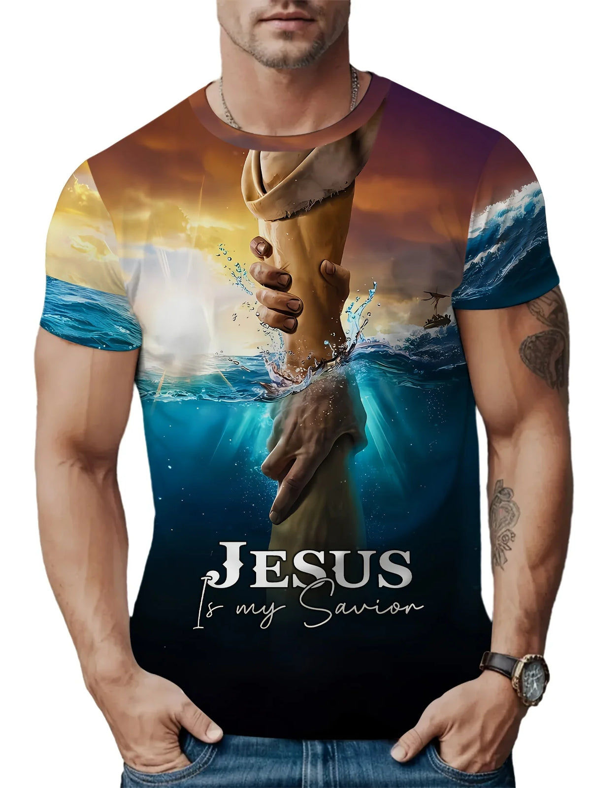 A man wearing a dark t-shirt featuring a graphic print of Jesus and the sea with dramatic lighting.