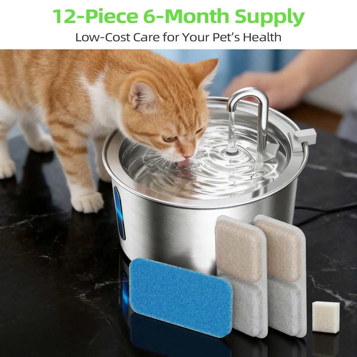 A cat is drinking from a stainless steel water fountain, with replacement filters and sponges displayed nearby.