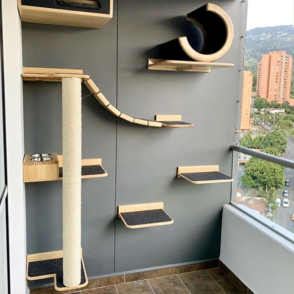 Wall-mounted cat climbing shelves featuring a hammock and scratching post mounted on a gray wall.
