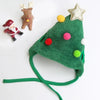 Un conjunto de disfraz navideño para gatos con un Santa, un alce y un accesorio de cachorro.