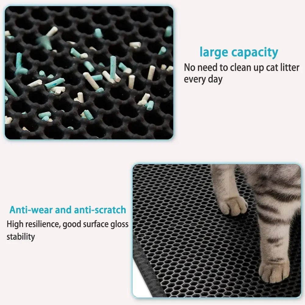 Close-up view of a black honeycomb cat litter mat showing small white and blue litter particles on the surface.