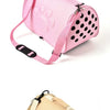 Pink breathable pet carrier bag for cats and small dogs with paw print design