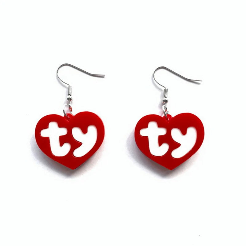 Pair of red acrylic heart drop earrings with a silver ear wire.