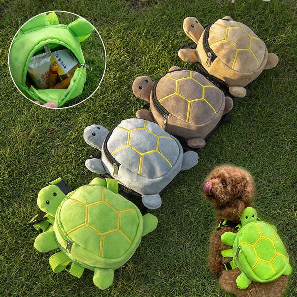 A collection of turtle-shaped pet backpacks in various shades of green and brown resting on green grass.
