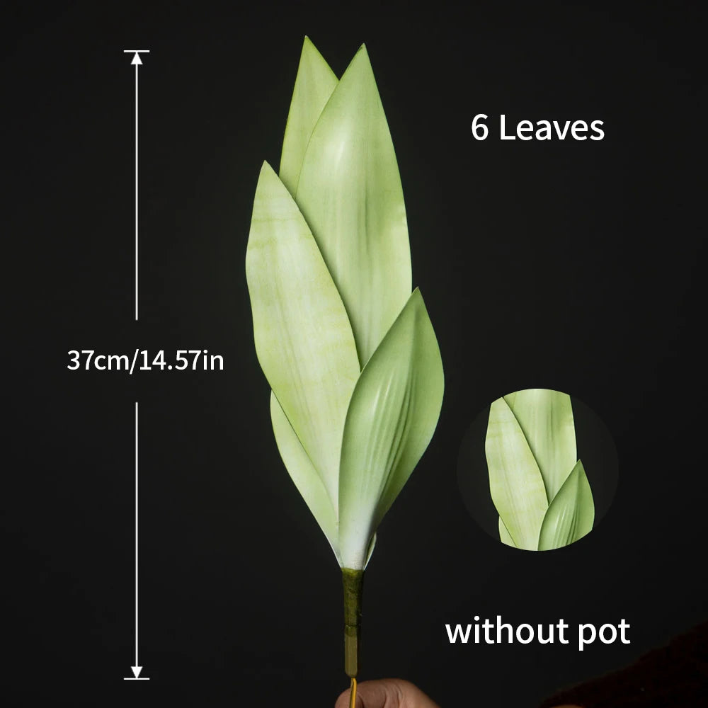 A vertical shot of a six-leaved artificial snake plant in green, shown without a pot.