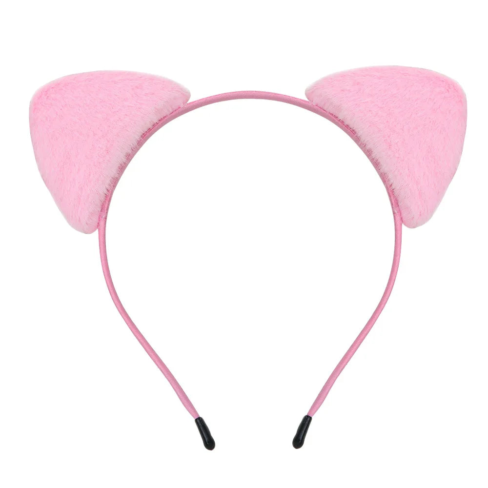 Pink plush cat ear headband with a thin pink strap for costumes and parties