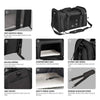 Black portable pet carrier bag with mesh, zippers, pockets, and shoulder strap.