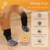 A close-up of a dog wearing anti-slip socks on its paw, designed for strong grip and protection.